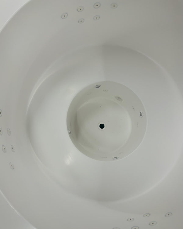 A bespoke round Omnitub whirlpool bath, hand-built in Somerset