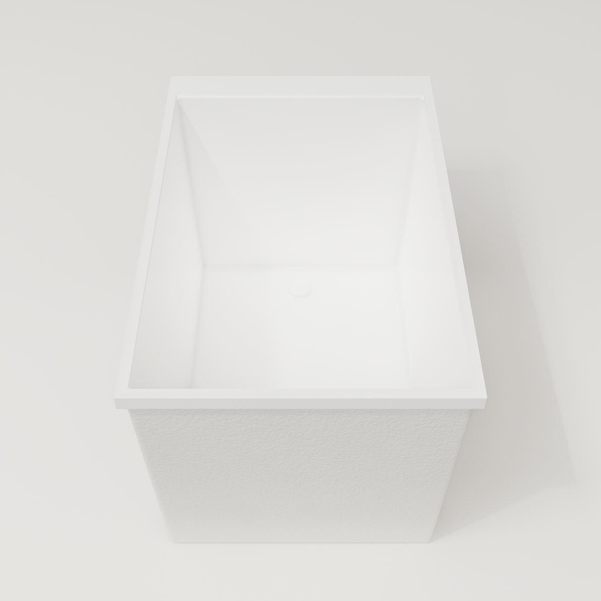 Omnitub Sheer 1100 deep soaking tub in white — 1100×700mm footprint, 600mm deep, end view, handmade in Britain [render:1_end_view:nofeet]
