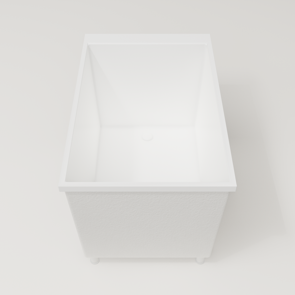 Omnitub Sheer 1100 deep soaking tub in white — 1100×700mm footprint, 600mm deep, end view, shown on feet, handmade in Britain [render:1_end_view:feet]
