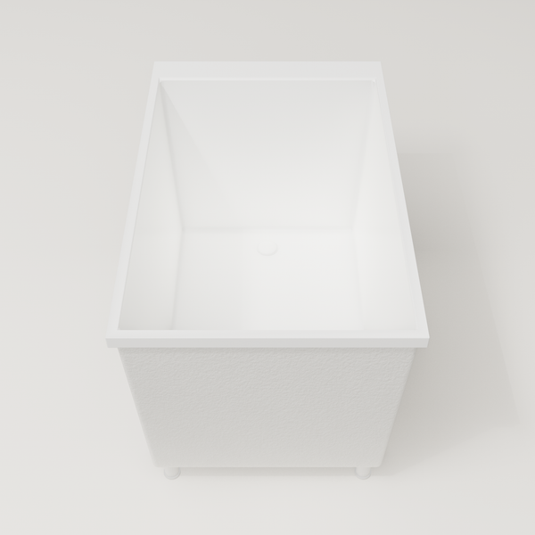 Omnitub Sheer 1100 deep soaking tub in white — 1100×700mm footprint, 600mm deep, end view, shown on feet, handmade in Britain [render:1_end_view:feet]
