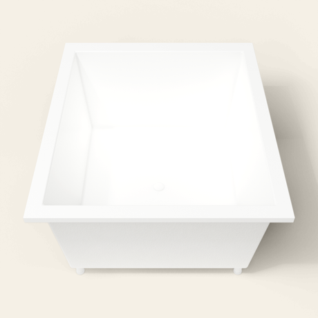 Omnitub 1400×1200 white deep soaking bath — end view, with feet [render:1_end_view:feet]