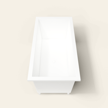 Omnitub 1900×900 white deep soaking bath — end view, with feet [render:1_end_view:feet]
