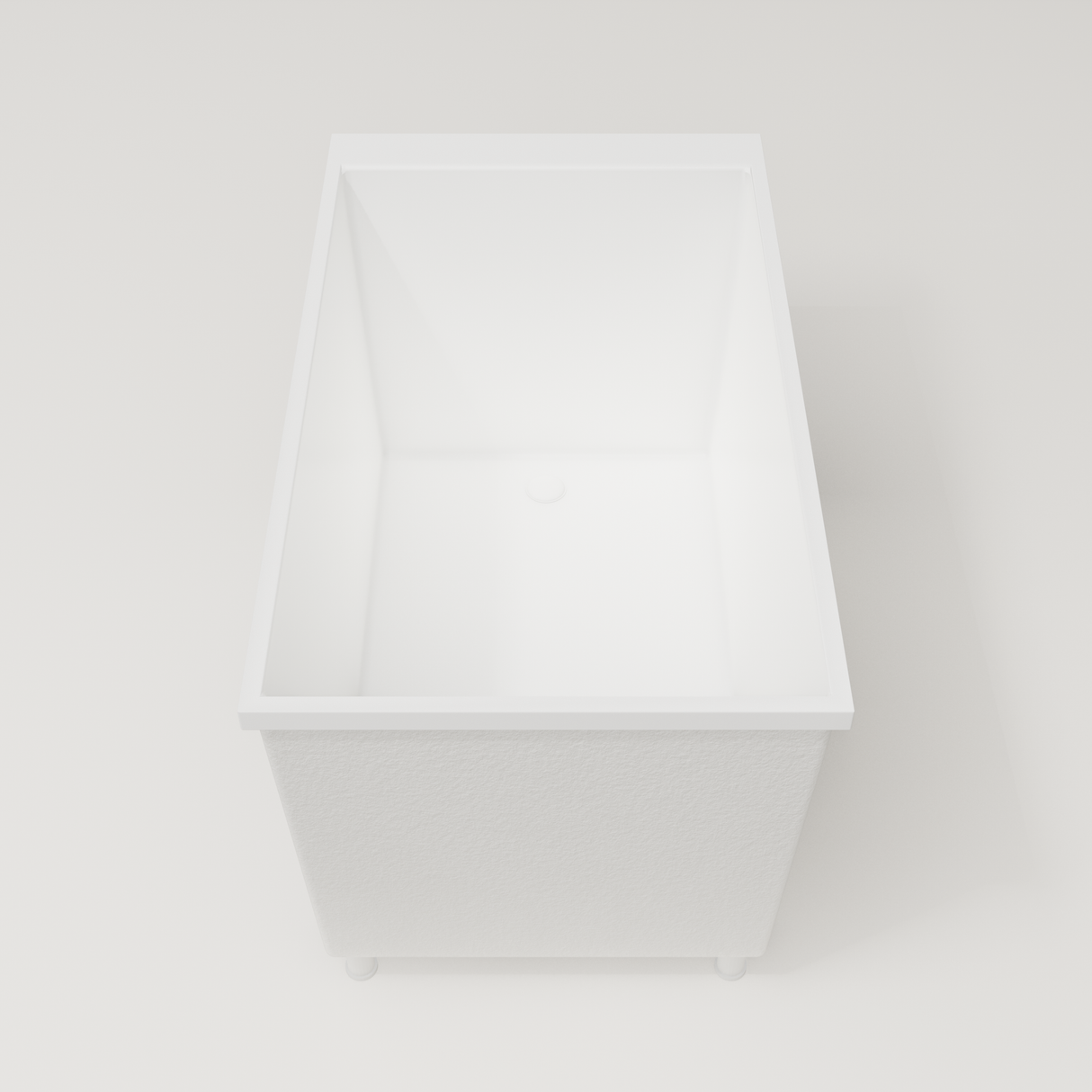 Omnitub Sheer 1200 deep soaking tub in white — 1200×700mm footprint, 600mm deep, end view, shown on feet, handmade in Britain [render:1_end_view:feet]