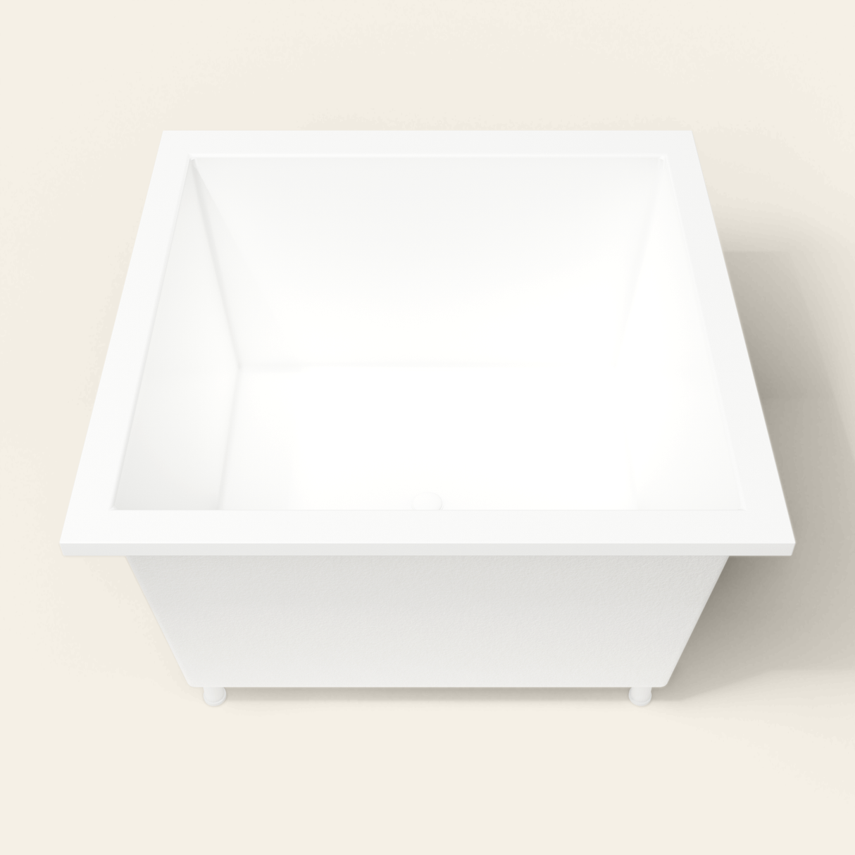 Omnitub 1200×1200 white deep soaking bath — end view, with feet [render:1_end_view:feet]