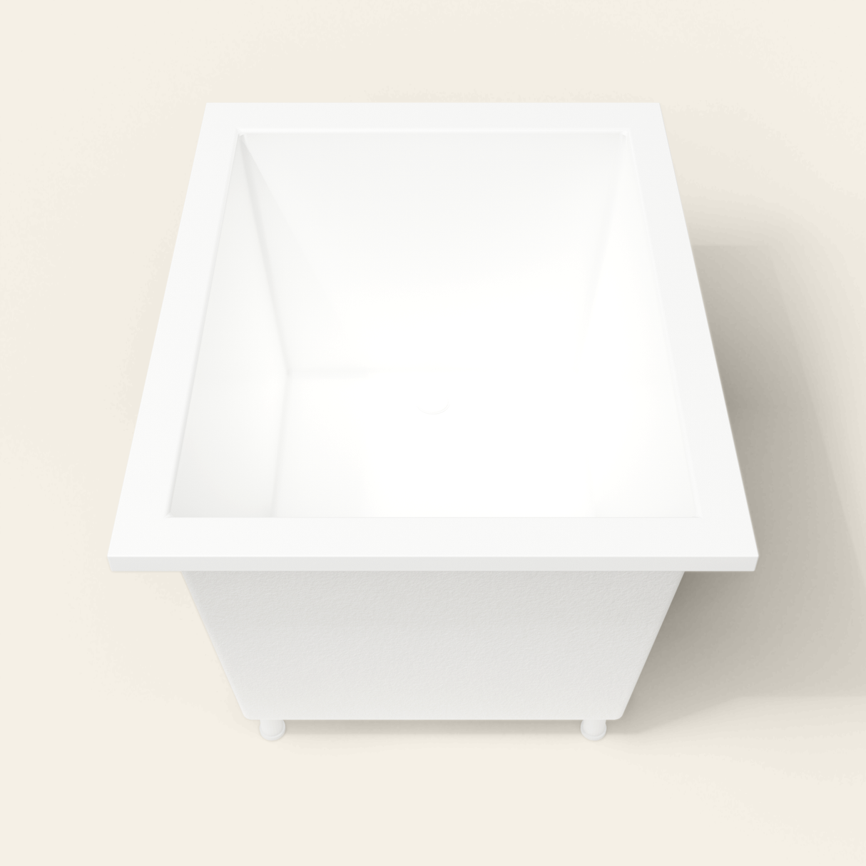 Omnitub 1150×900 white deep soaking bath — end view, with feet [render:1_end_view:feet]