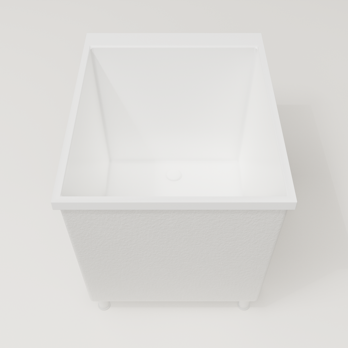 Omnitub Sheer 900 deep soaking tub in white — 900×700mm footprint, 600mm deep, end view, shown on feet, handmade in Britain [render:1_end_view:feet]