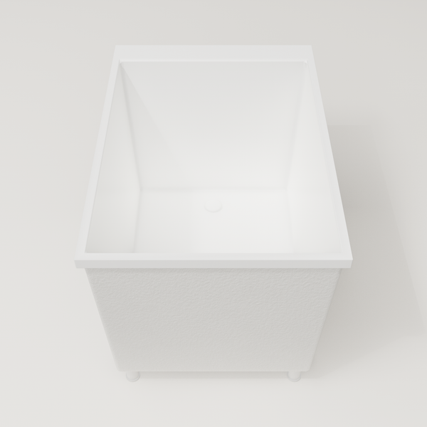 Omnitub Sheer 1000 deep soaking tub in white — 1000×700mm footprint, 600mm deep, end view, shown on feet, handmade in Britain [render:1_end_view:feet]