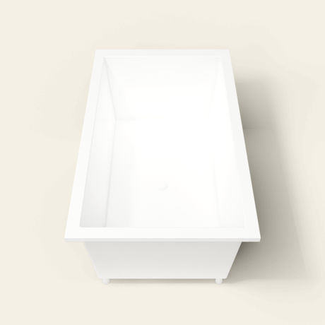 Omnitub 1800×1050 white deep soaking bath — end view, with feet [render:1_end_view:feet]