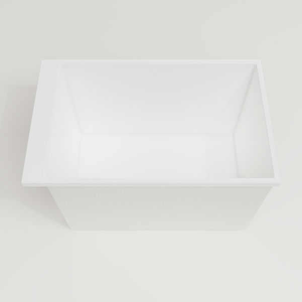 Omnitub Sheer 1100 deep soaking tub in white — 1100×700mm footprint, 600mm deep, looking into the deep well, handmade in Britain [render:3_deep_hero:nofeet]