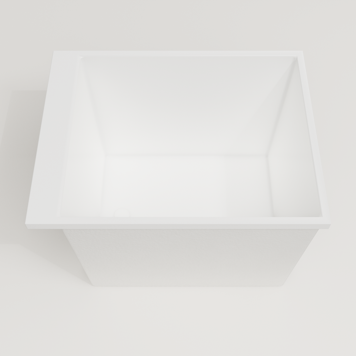 Omnitub Sheer 900 deep soaking tub in white — 900×700mm footprint, 600mm deep, looking into the deep well, handmade in Britain [render:3_deep_hero:nofeet]