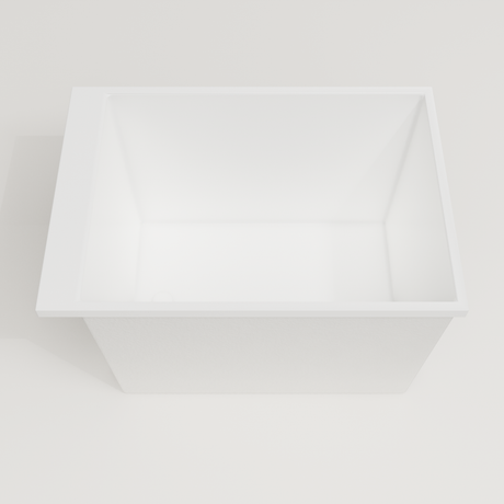 Omnitub Sheer 1000 deep soaking tub in white — 1000×700mm footprint, 600mm deep, looking into the deep well, handmade in Britain [render:3_deep_hero:nofeet]