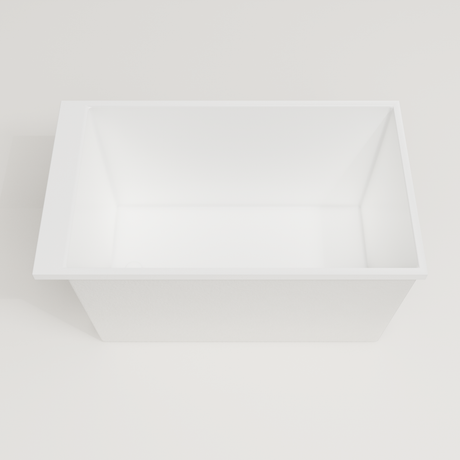 Omnitub Sheer 1200 deep soaking tub in white — 1200×700mm footprint, 600mm deep, looking into the deep well, handmade in Britain [render:3_deep_hero:nofeet]