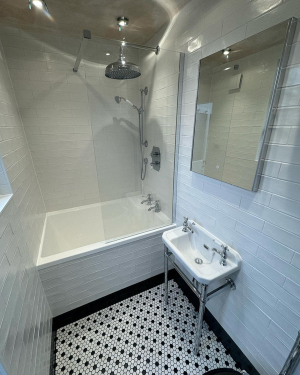 Omnitub Solo Supreme 1250 x 850 UK deep soaking tub 600mm depth rectangular - side angle