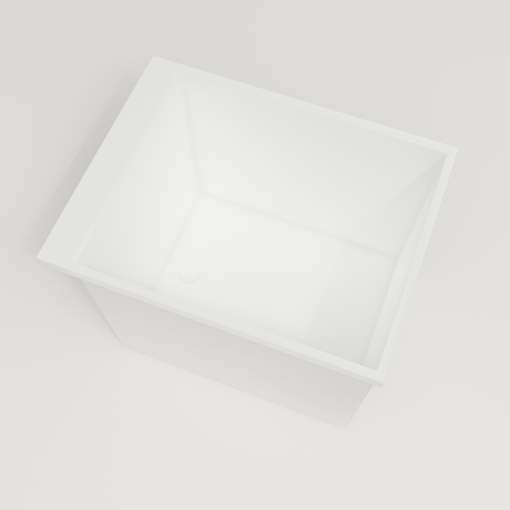 Omnitub Sheer 900 deep soaking tub in white — 900×700mm footprint, 600mm deep, steep near-vertical wall, handmade in Britain [render:4_steep_into_well:nofeet]