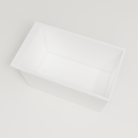 Omnitub Sheer 1200 deep soaking tub in white — 1200×700mm footprint, 600mm deep, steep near-vertical wall, handmade in Britain [render:4_steep_into_well:nofeet]