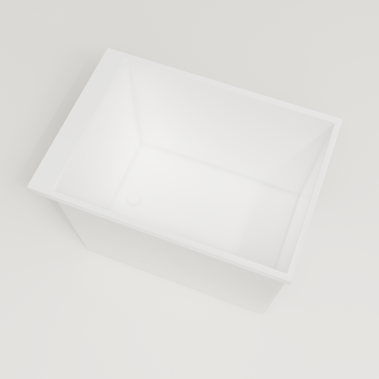 Omnitub Sheer 1000 deep soaking tub in white — 1000×700mm footprint, 600mm deep, steep near-vertical wall, handmade in Britain [render:4_steep_into_well:nofeet]