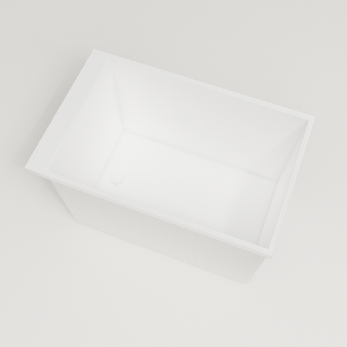 Omnitub Sheer 1100 deep soaking tub in white — 1100×700mm footprint, 600mm deep, steep near-vertical wall, handmade in Britain [render:4_steep_into_well:nofeet]