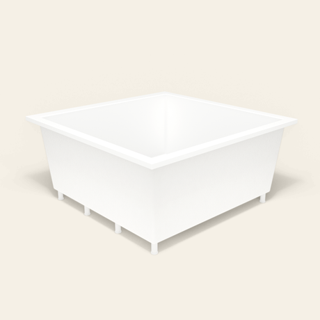 Omnitub 1500×1500 white deep soaking bath — three-quarter, with feet [render:6_grounded:feet]