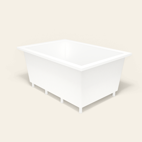 Omnitub 1500×1050 white deep soaking bath — three-quarter, with feet [render:6_grounded:feet]