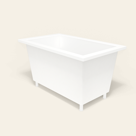 Omnitub 1250×750 white deep soaking bath — three-quarter, with feet [render:6_grounded:feet]