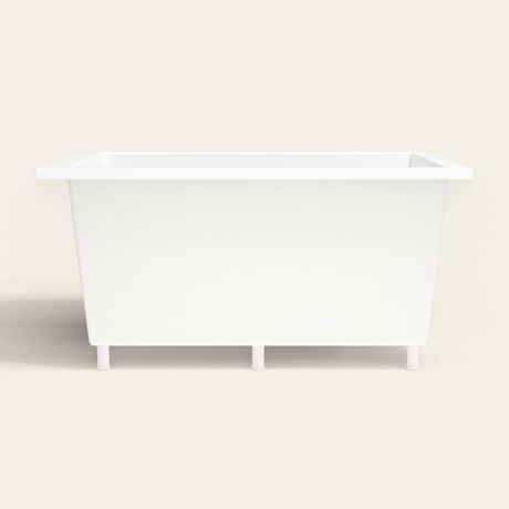 Omnitub 1400×900 white deep soaking bath — side profile, with feet [render:7_long_side:feet]