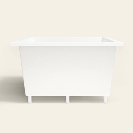Omnitub 1200×1200 white deep soaking bath — side profile, with feet [render:7_long_side:feet]