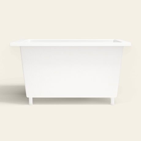Omnitub 1250×750 white deep soaking bath — side profile, with feet [render:7_long_side:feet]