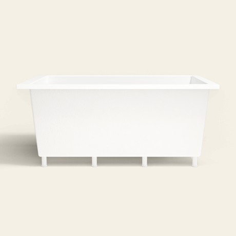 Omnitub 1600×1050 white deep soaking bath — side profile, with feet [render:7_long_side:feet]