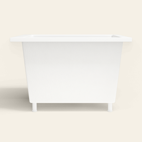 Omnitub 1050×750 white deep soaking bath — side profile, with feet [render:7_long_side:feet]
