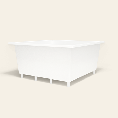 Omnitub 1400×1400 white deep soaking bath — low hero, with feet [render:8_low_hero:feet]