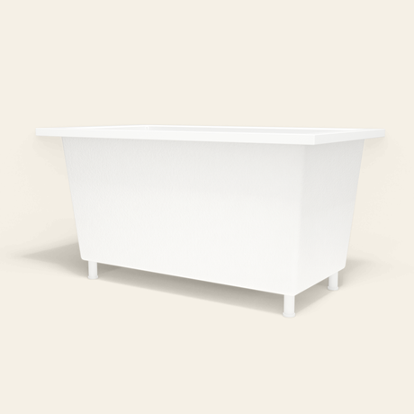 Omnitub 1350×750 white deep soaking bath — low hero, with feet [render:8_low_hero:feet]
