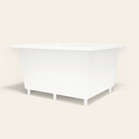 Omnitub 1250×1050 white deep soaking bath — low hero, with feet [render:8_low_hero:feet]