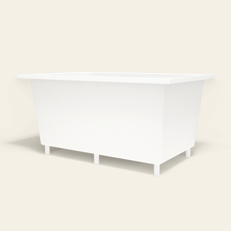 Omnitub 1400×900 white deep soaking bath — low hero, with feet [render:8_low_hero:feet]