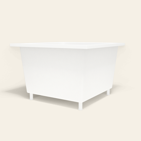 Omnitub 1050×1050 white deep soaking bath — low hero, with feet [render:8_low_hero:feet]