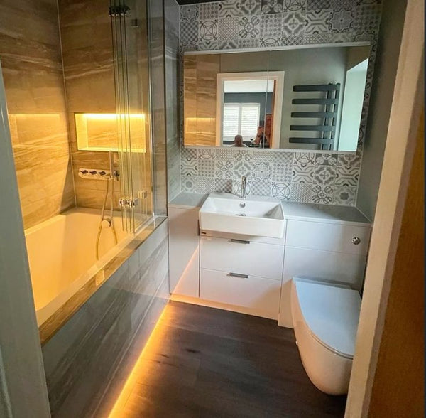 Omnitub 1400 x 800 deep soaking tub 600mm depth rectangular - side angle