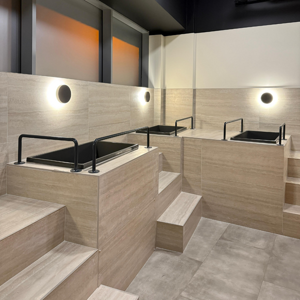 Omnitub 1100 x 600 UK seated soaking tub 1000mm depth rectangular - side angle