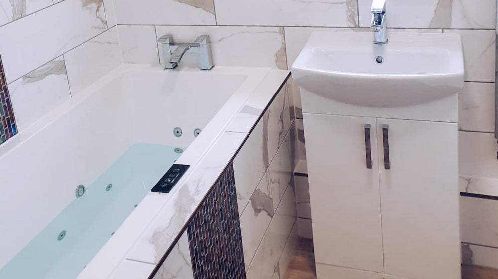 Deep whirlpool bath installation