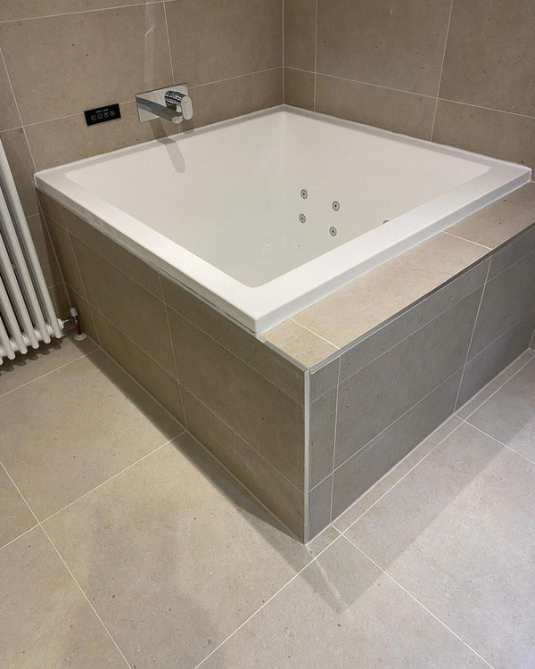 Omnitub 1200 x 1200 deep soaking tub 600mm depth square - side angle