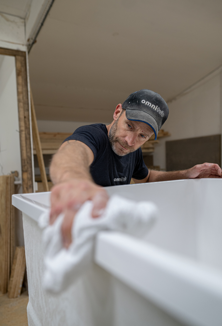 Omnitub deep soaking bath being hand-finished in our Somerset workshop