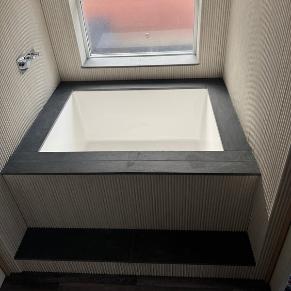 Omnitub 1500 x 1050 handmade UK deep soaking tub 600mm depth wide rectangular - side angle