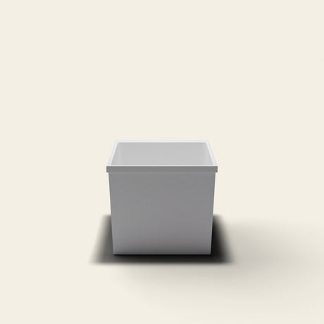 Omnitub Sheer 1000 deep soaking tub in white — 1000×700mm footprint, 600mm deep, near-vertical walls, hand-polished Omnigel — end elevation [render:endelev:nofeet]