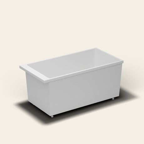 Omnitub Sheer 1400 deep soaking tub in white — 1400×700mm footprint, 600mm deep, near-vertical walls, hand-polished Omnigel, on adjustable feet — side three-quarter [render:ext3q:feet]