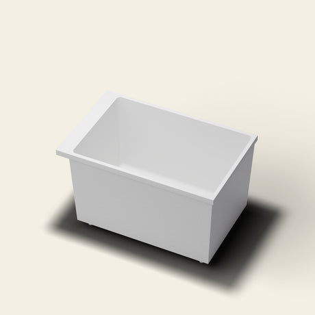 Omnitub Sheer 1100 deep soaking tub in white — 1100×700mm footprint, 600mm deep, near-vertical walls, hand-polished Omnigel, on adjustable feet — hero [render:hero:feet]