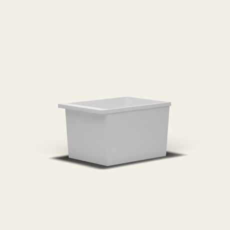Omnitub Sheer 1000 deep soaking tub in white — 1000×700mm footprint, 600mm deep, near-vertical walls, hand-polished Omnigel — low angle [render:lowcorner:nofeet]