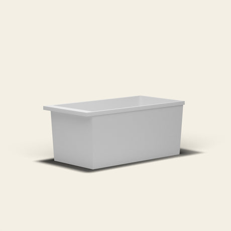 Omnitub Sheer 1400 deep soaking tub in white — 1400×700mm footprint, 600mm deep, near-vertical walls, hand-polished Omnigel — low angle [render:lowcorner:nofeet]