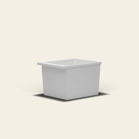 Omnitub Sheer 900 deep soaking tub in white — 900×700mm footprint, 600mm deep, near-vertical walls, hand-polished Omnigel — low angle [render:lowcorner:nofeet]