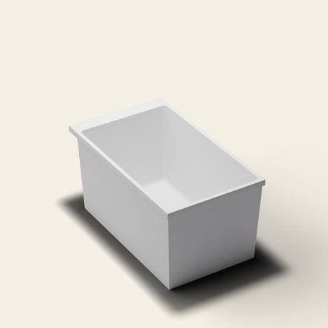 Omnitub Sheer 1200 deep soaking tub in white — 1200×700mm footprint, 600mm deep, near-vertical walls, hand-polished Omnigel — three-quarter [render:quarter:nofeet]