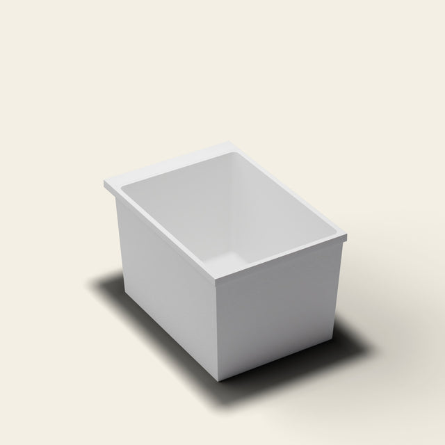 Omnitub Sheer 1000 deep soaking tub in white — 1000×700mm footprint, 600mm deep, near-vertical walls, hand-polished Omnigel — three-quarter [render:quarter:nofeet]