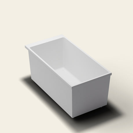 Omnitub Sheer 1400 deep soaking tub in white — 1400×700mm footprint, 600mm deep, near-vertical walls, hand-polished Omnigel, on adjustable feet — three-quarter [render:quarter:feet]