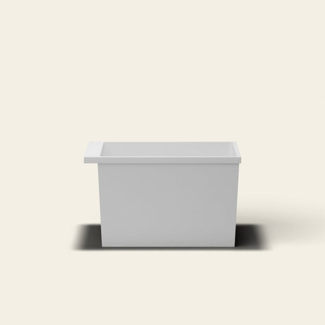 Omnitub Sheer 1000 deep soaking tub in white — 1000×700mm footprint, 600mm deep, near-vertical walls, hand-polished Omnigel — side elevation [render:sideon:nofeet]